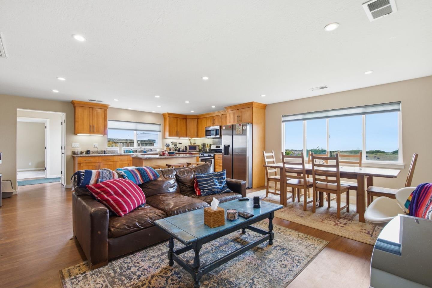 1263 Reservoir Road Pescadero, CA 94060 - Photo 52 of 66 a living room with furniture kitchen view and a large window
