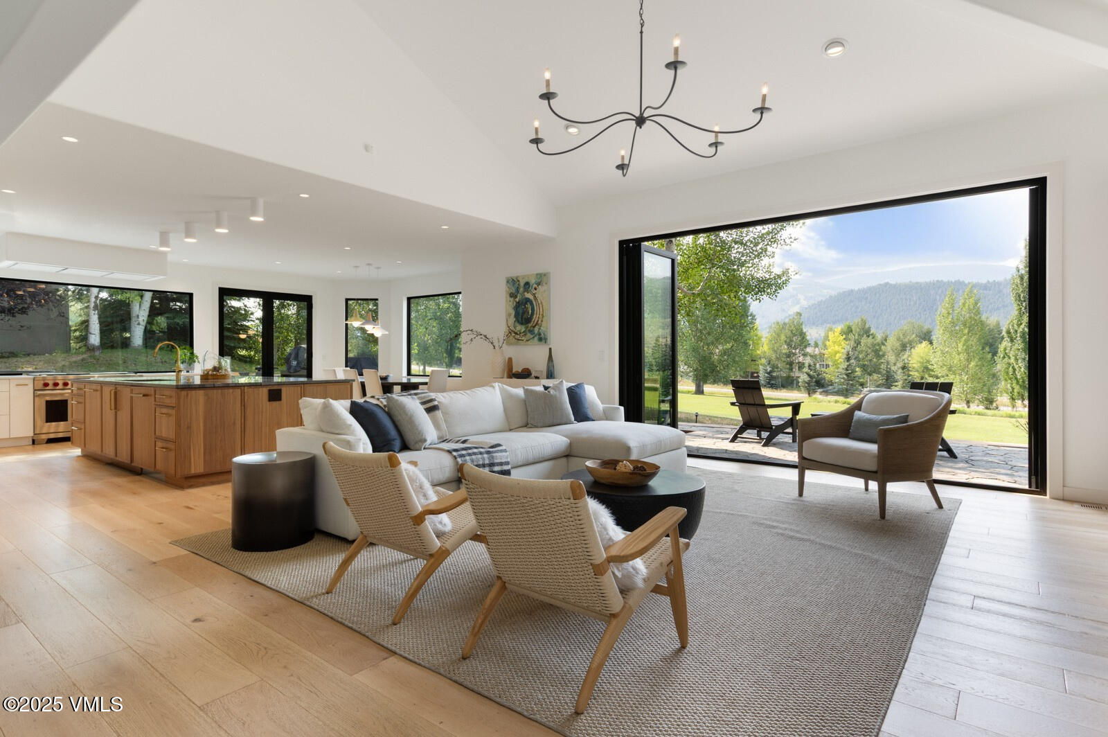 161 Stagecoach Road Edwards, CO 81632 - Photo 1 of 48 a living room with furniture large window and flat screen tv