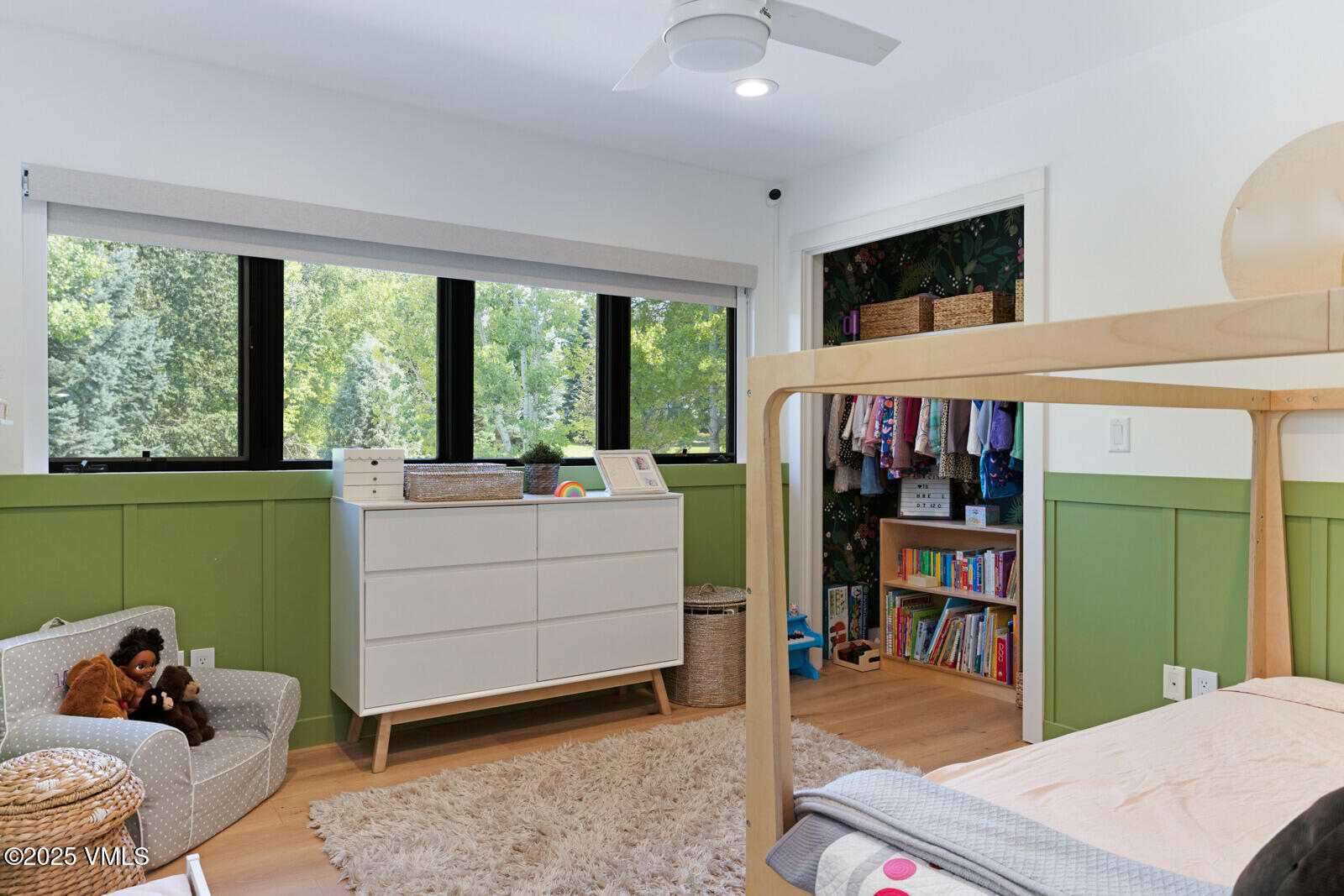 161 Stagecoach Road Edwards, CO 81632 - Photo 20 of 48 a room with furniture a flat screen tv and a large window