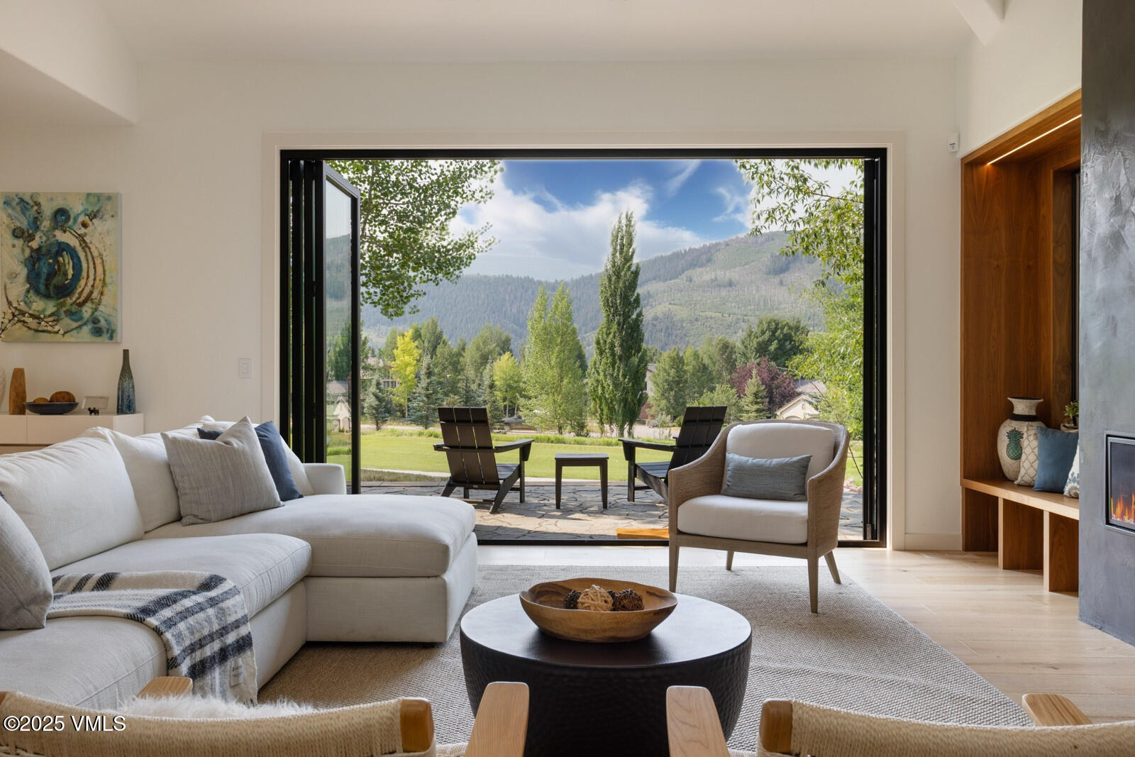 161 Stagecoach Road Edwards, CO 81632 - Photo 3 of 48 a living room with fireplace furniture and a large window
