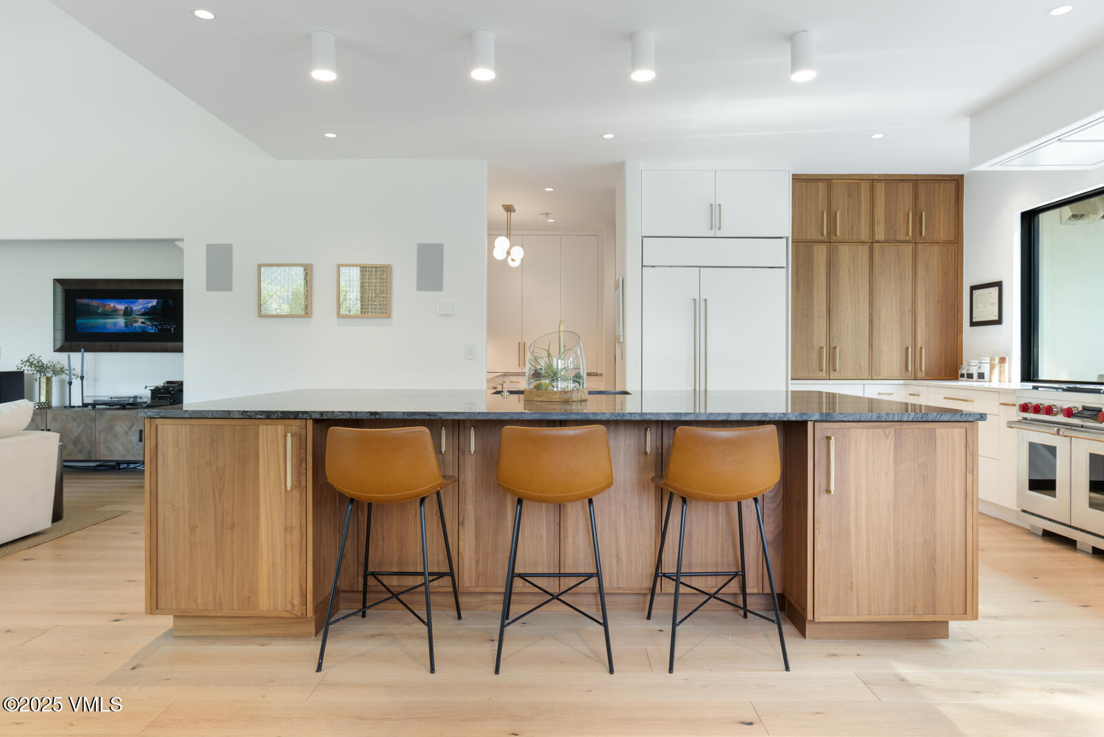 161 Stagecoach Road Edwards, CO 81632 - Photo 31 of 48 a kitchen with stainless steel appliances granite countertop a table chairs sink and cabinets