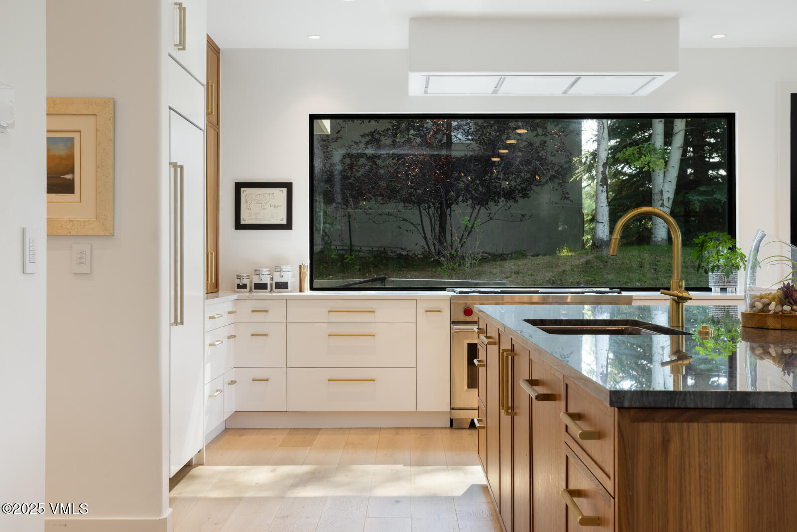 161 Stagecoach Road Edwards, CO 81632 - Photo 34 of 48 a kitchen with stainless steel appliances granite countertop a stove and a sink