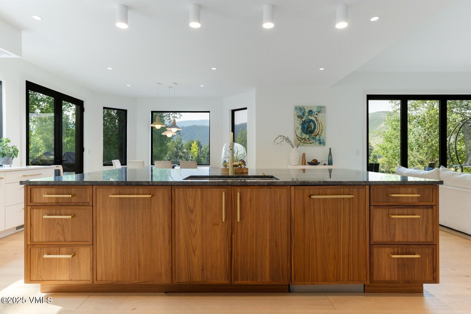 161 Stagecoach Road Edwards, CO 81632 - Photo 35 of 48 a view of kitchen with windows and wooden cabinets