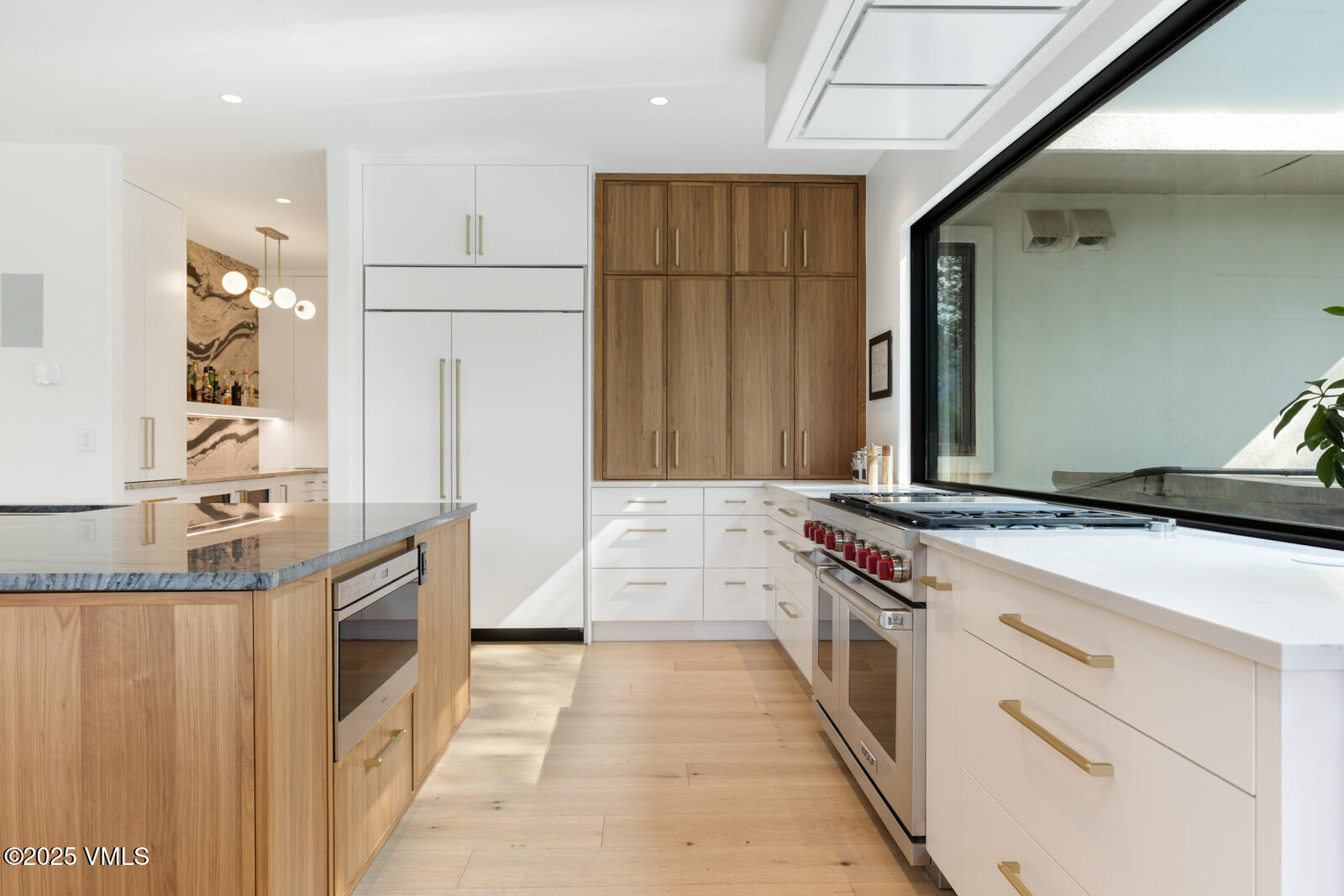 161 Stagecoach Road Edwards, CO 81632 - Photo 36 of 48 a kitchen with stainless steel appliances granite countertop a stove and a refrigerator