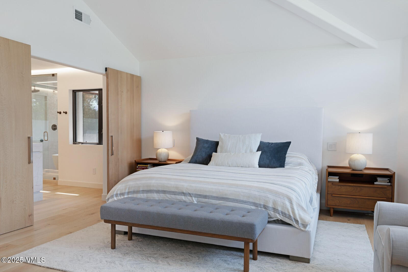 161 Stagecoach Road Edwards, CO 81632 - Photo 41 of 48 a bedroom with a bed and a lamp