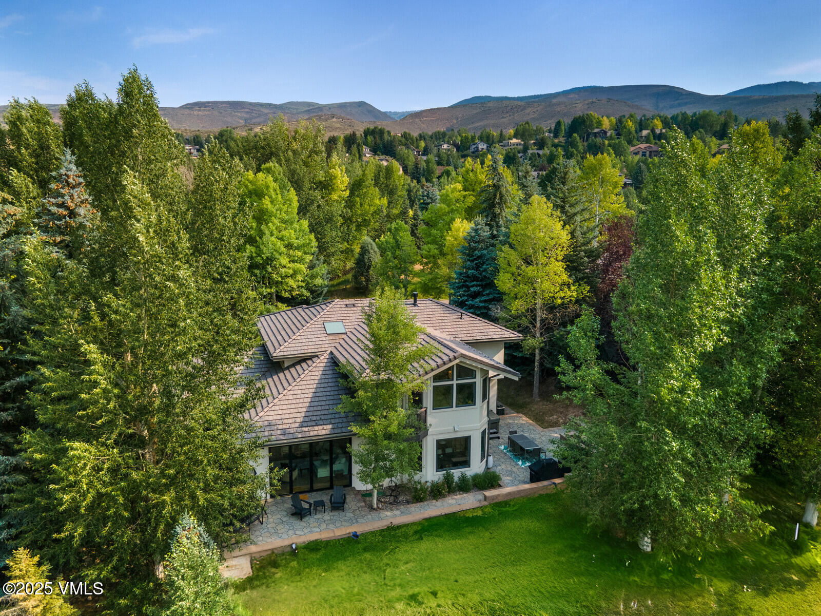 161 Stagecoach Road Edwards, CO 81632 - Photo 42 of 48 a view of a house with a yard
