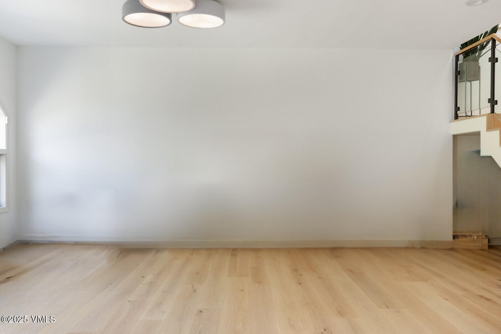 161 Stagecoach Road Edwards, CO 81632 - Photo 44 of 48 a view of a room with a white wall and a window
