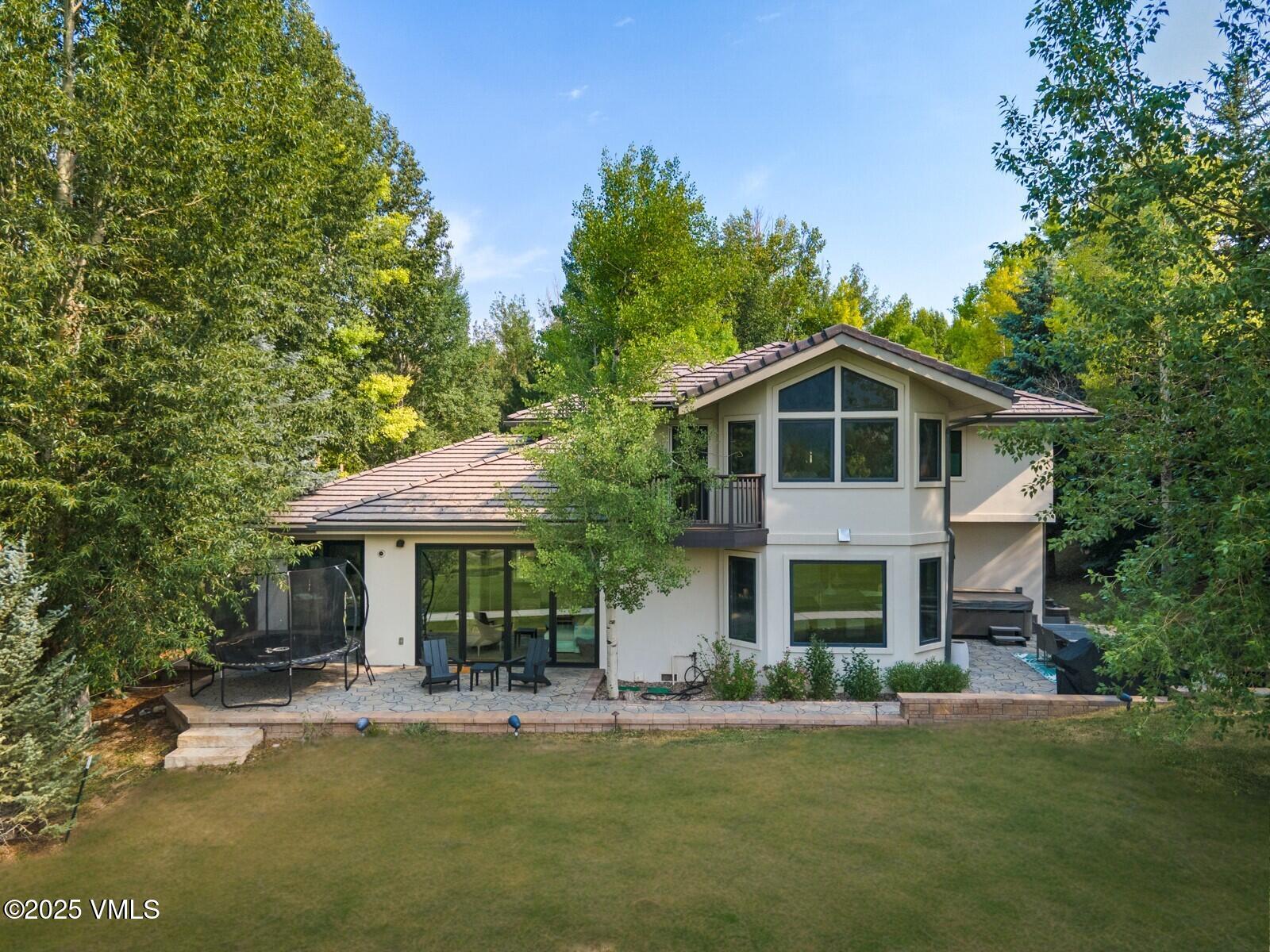 161 Stagecoach Road Edwards, CO 81632 - Photo 48 of 48 a front view of a house with a garden