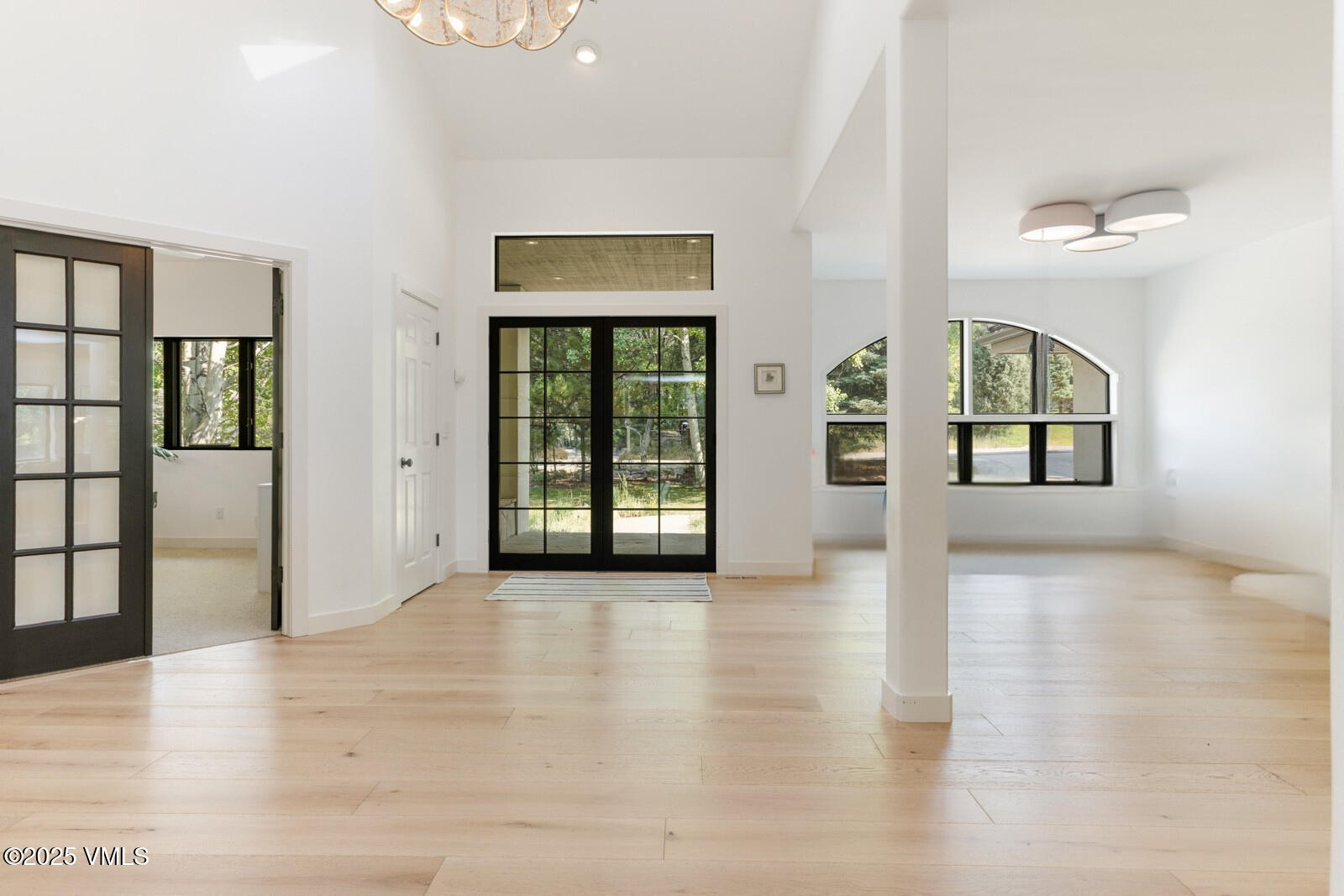 161 Stagecoach Road Edwards, CO 81632 - Photo 9 of 48 a view of an entryway with wooden floor and a livingroom