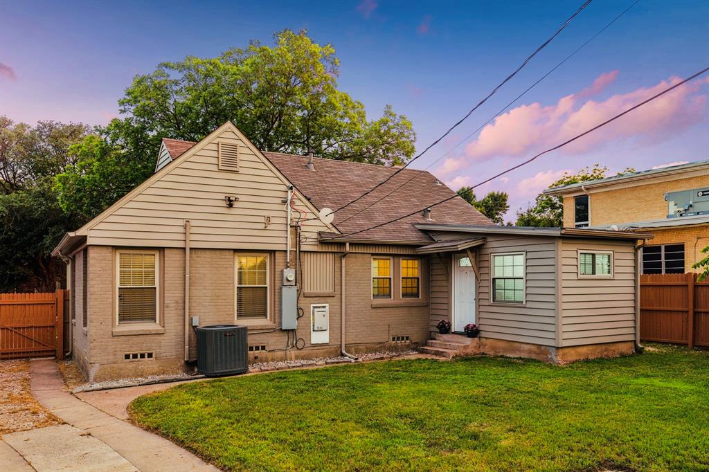 2427 Alco Avenue Dallas, TX 75211 - Photo 24 of 26 a view of a house with a yard