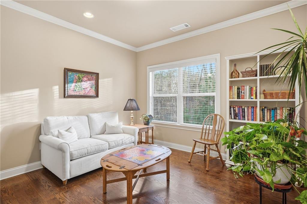 262 Trecastle Square Canton, GA 30114 - Photo 20 of 46 a living room with furniture and a window