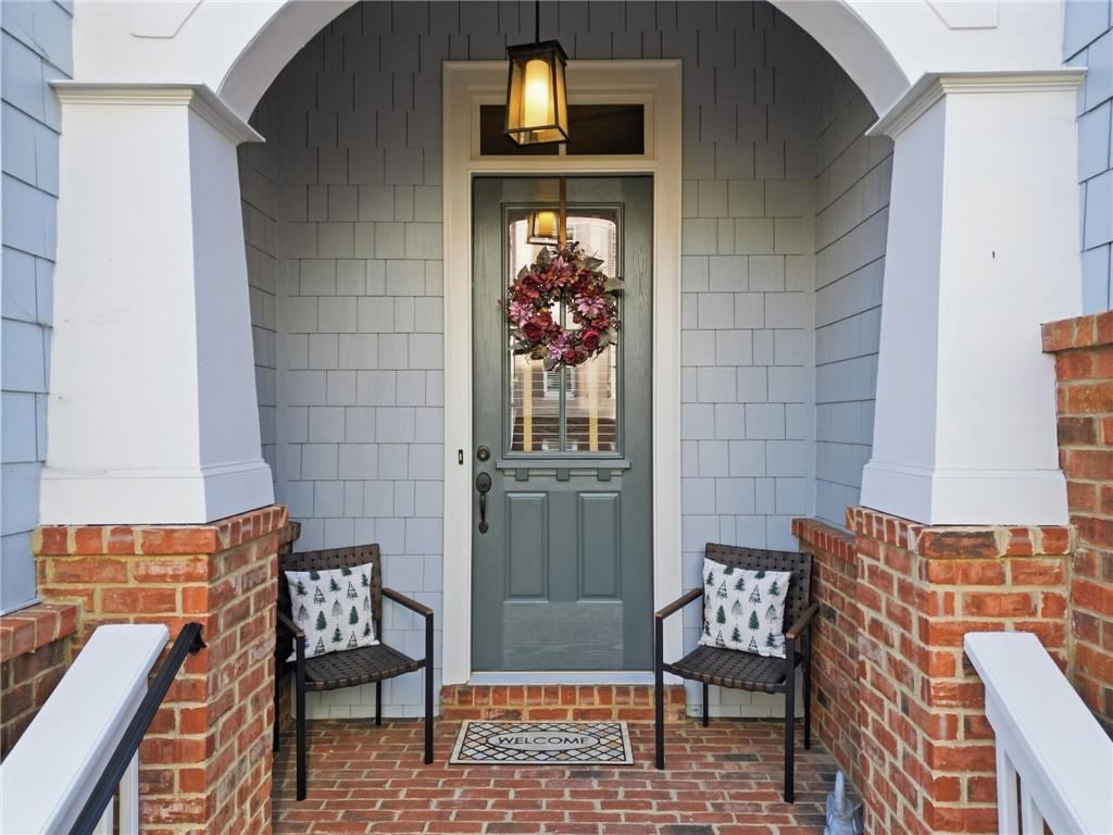 262 Trecastle Square Canton, GA 30114 - Photo 2 of 46 a front view of a house with outdoor seating