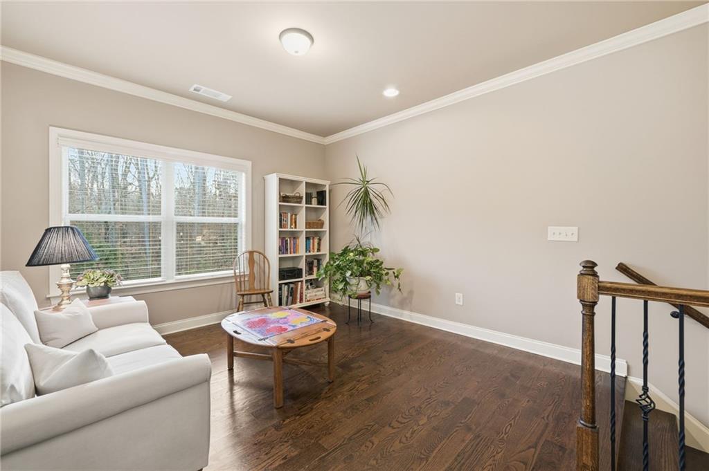 262 Trecastle Square Canton, GA 30114 - Photo 21 of 46 a living room with furniture and a table