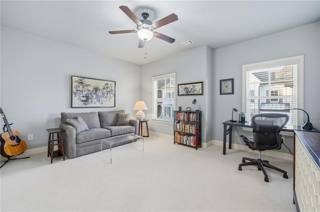 262 Trecastle Square Canton, GA 30114 - Photo 29 of 46 a view of a livingroom with workspace and a couch