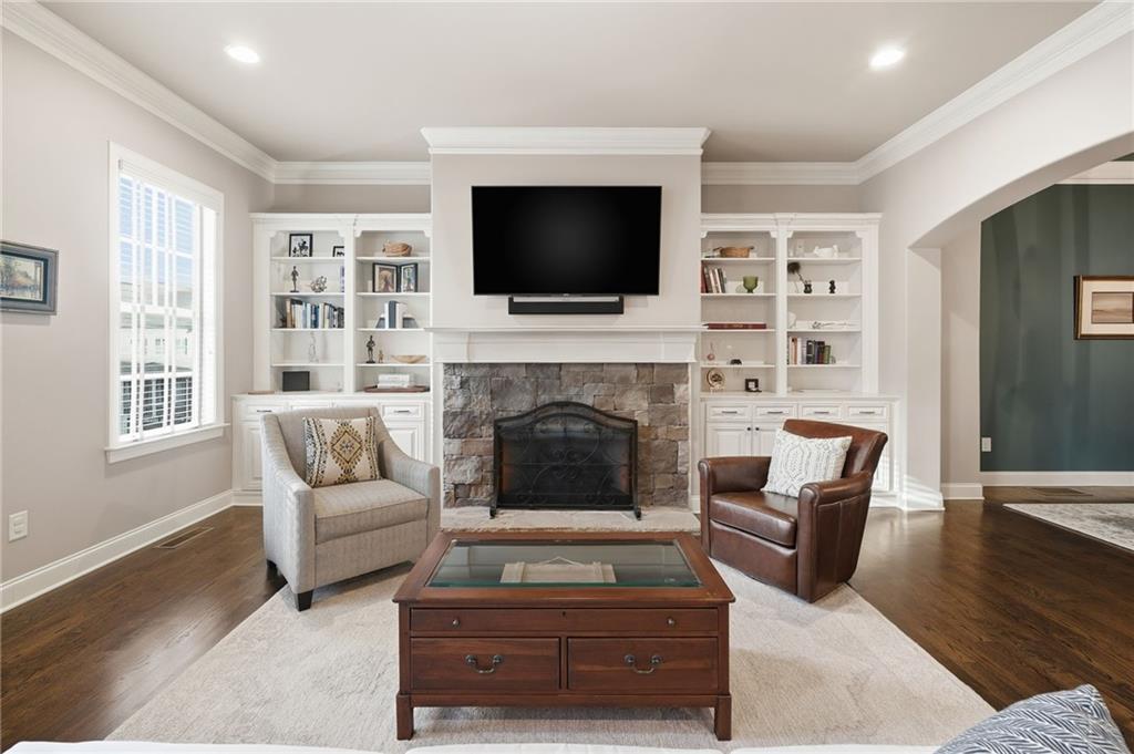 262 Trecastle Square Canton, GA 30114 - Photo 3 of 46 a living room with furniture fireplace and flat screen tv