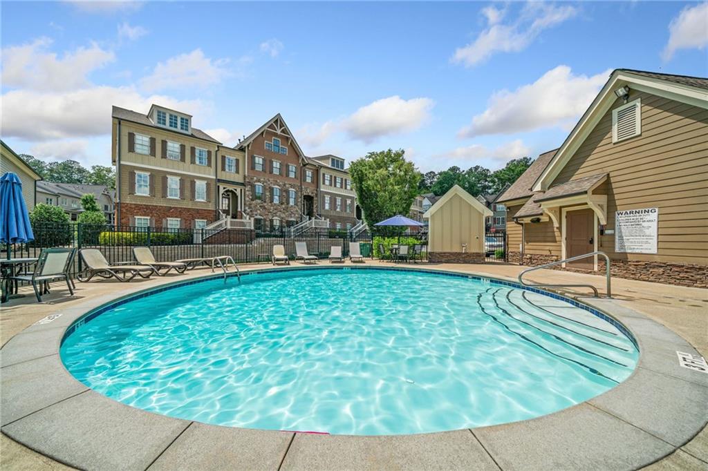 262 Trecastle Square Canton, GA 30114 - Photo 38 of 46 a view of a house with swimming pool
