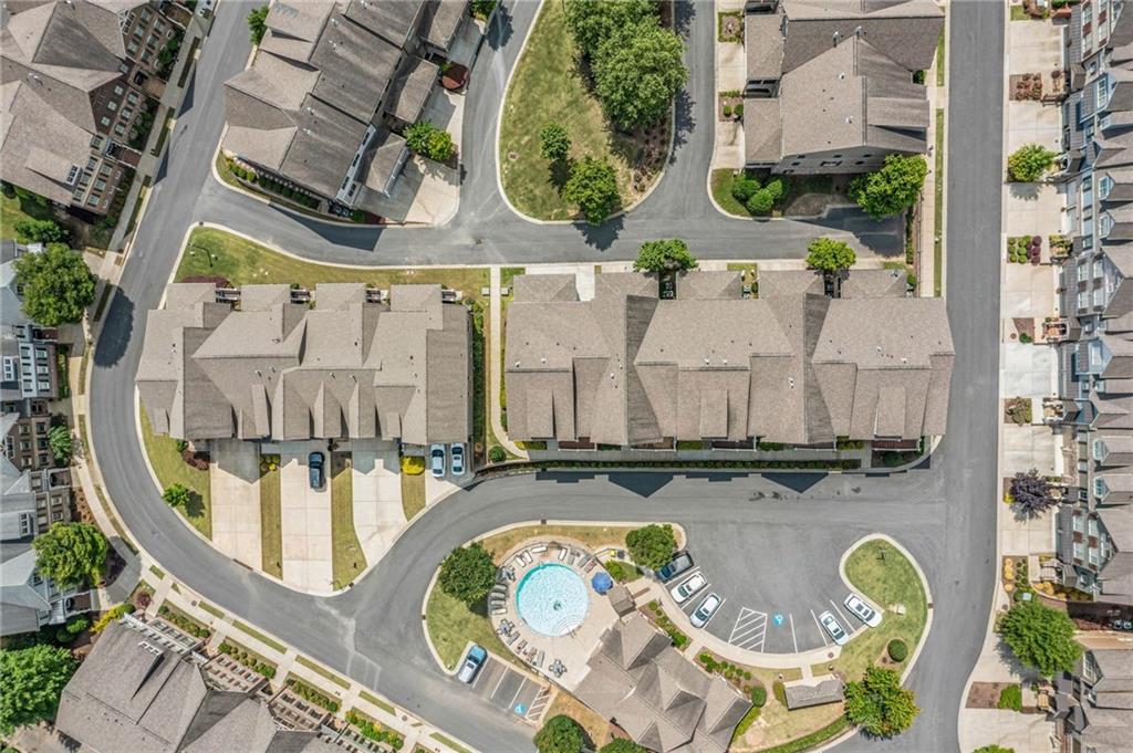 262 Trecastle Square Canton, GA 30114 - Photo 43 of 46 an aerial view of a swimming pool with outdoor seating and outdoor space