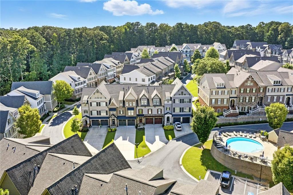 262 Trecastle Square Canton, GA 30114 - Photo 44 of 46 swimming pool view with sitting space
