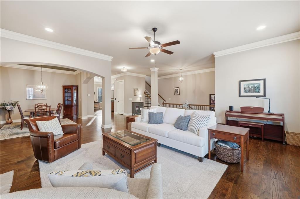 262 Trecastle Square Canton, GA 30114 - Photo 10 of 46 a living room with furniture and wooden floor