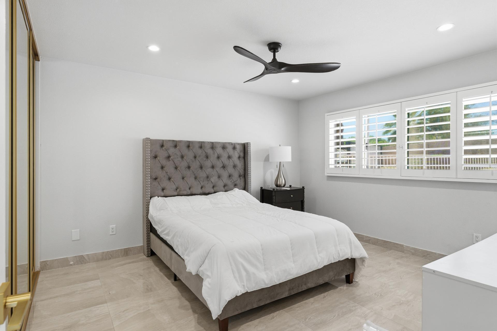 40961 Cecina Way Bermuda Dunes, CA 92203 - Photo 14 of 27 a bedroom with a bed and a window