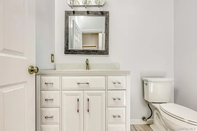 a view of a livingroom with furniture and cabinet