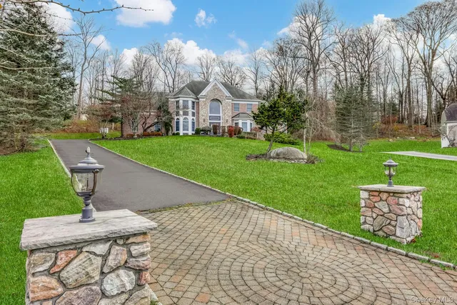 a view of a patio with a yard