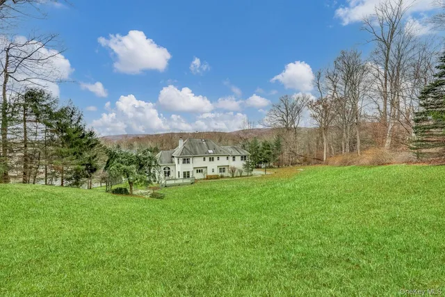 a view of a golf course with a lake