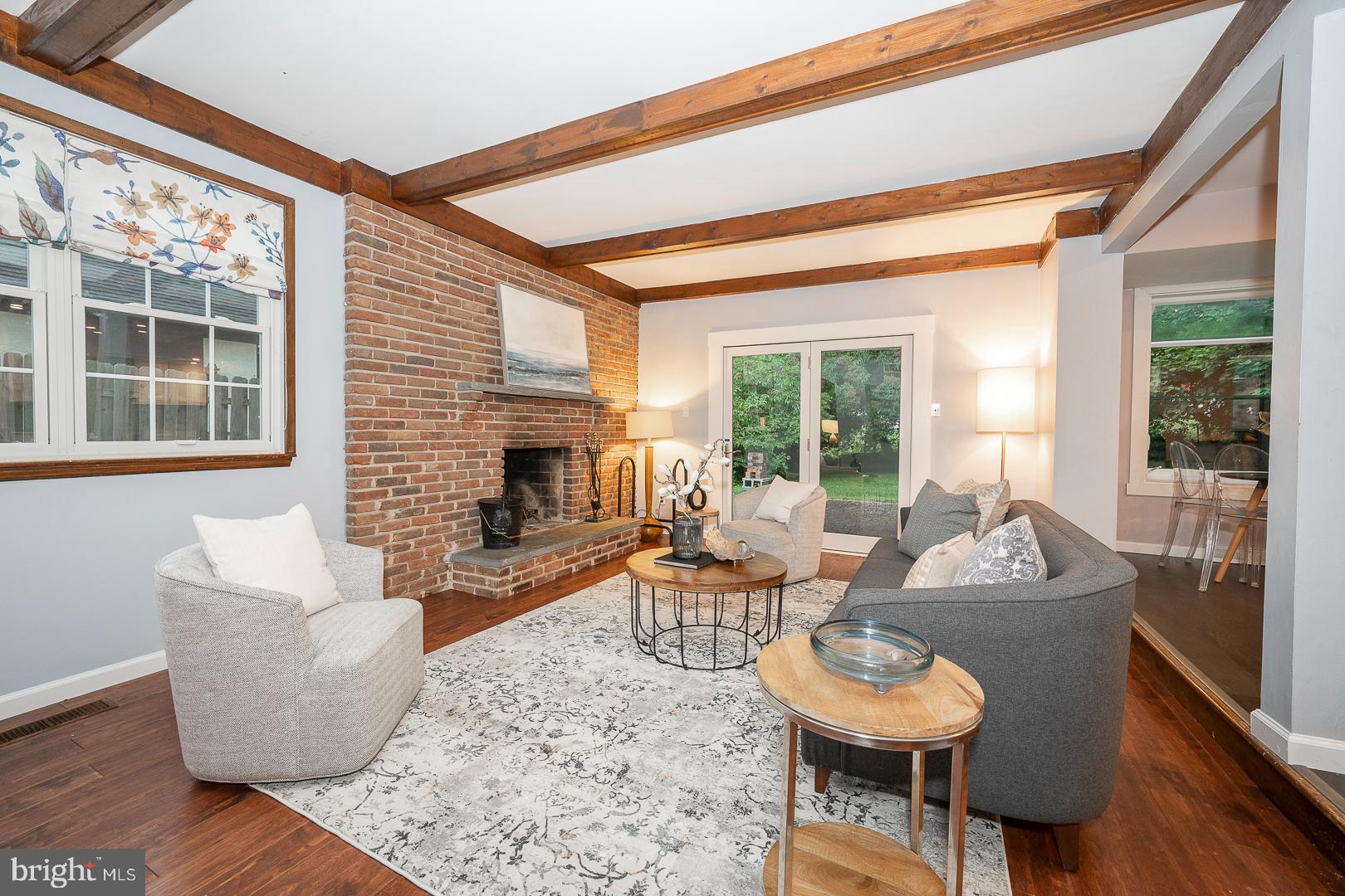 12 Raynham Road Merion Station, PA 19066 - Photo 18 of 39 Fireplace and Beamed Ceiling