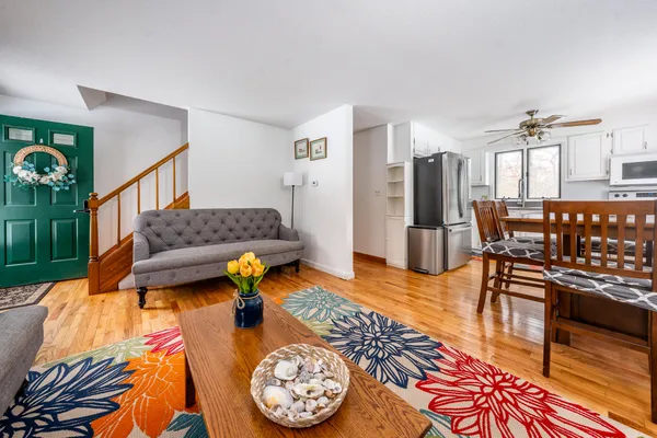a living room with furniture and a table