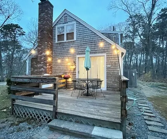 a view of a two chairs in the deck