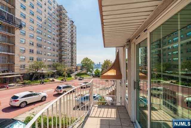 57 71st Street Guttenberg, NJ 07093 - Photo 3 of 18 a view of a balcony with yard