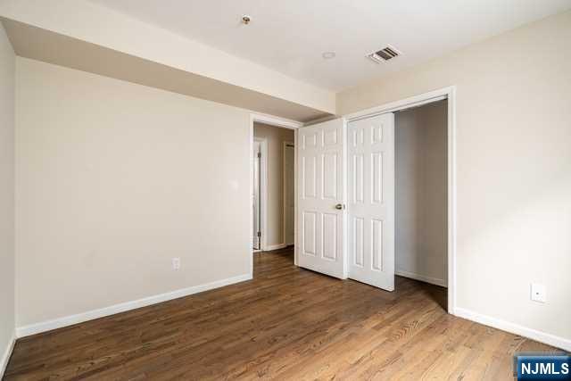 57 71st Street Guttenberg, NJ 07093 - Photo 10 of 18 a view of an empty room