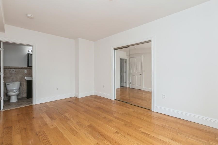 125 43rd Street, Unit 604 Union City, NJ 07087 - Photo 14 of 17 a view of an empty room and window