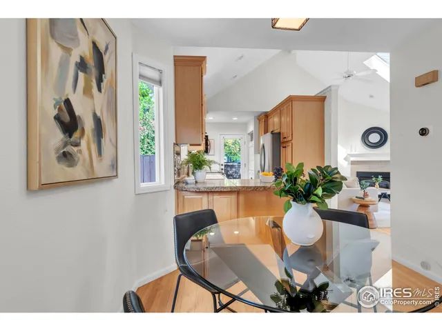 a outdoor dining space with furniture and window