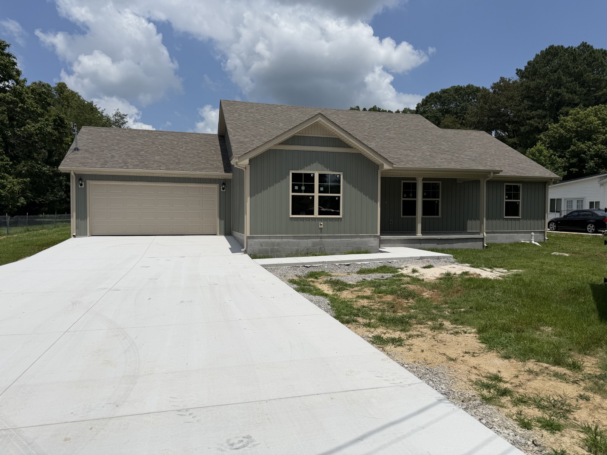 769 Old Bushy Branch Road Manchester, TN 37355 - Photo 1 of 24 a front view of a house with garden