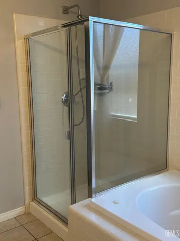 a view of a bathroom with a bathtub