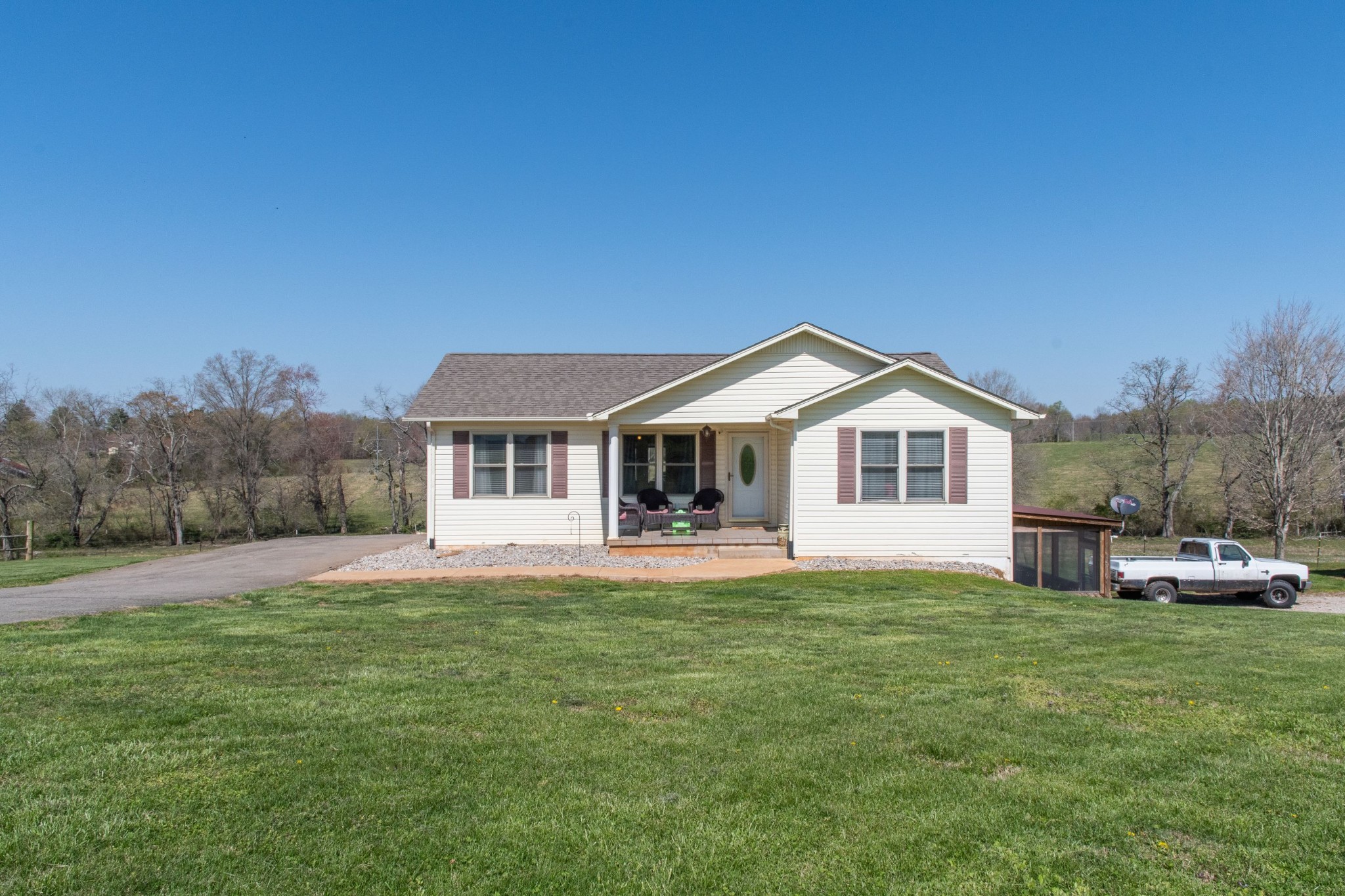 319 Wirmingham Road Monroe, TN 38573 - Photo 1 of 34 a front view of a house with a yard