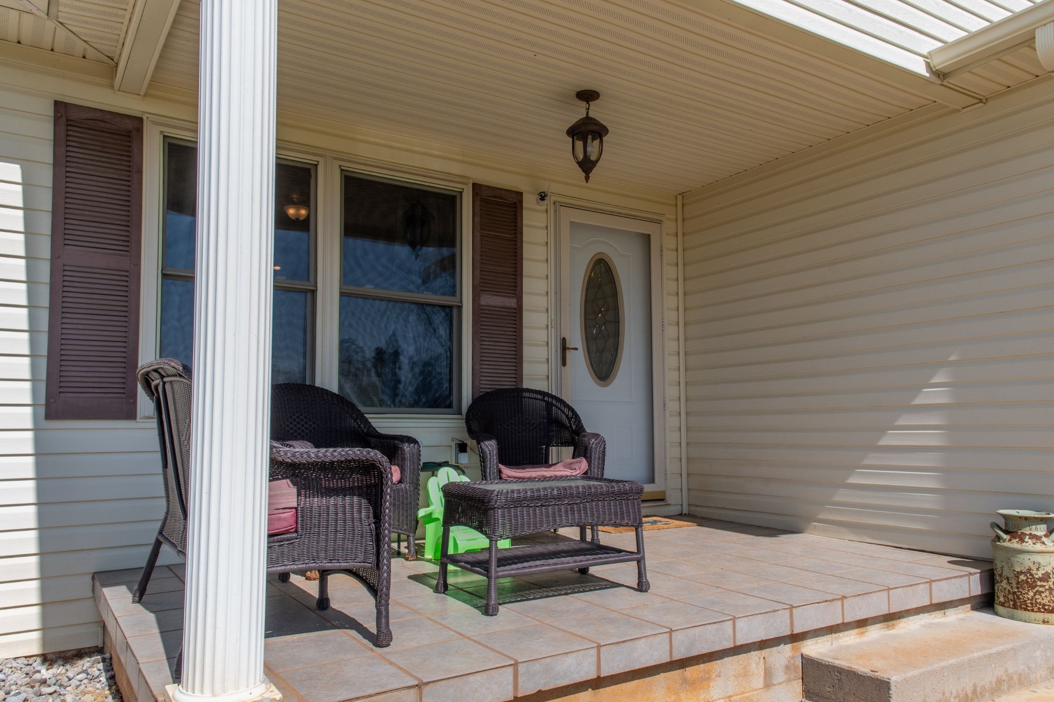 319 Wirmingham Road Monroe, TN 38573 - Photo 2 of 34 a patio with table and chairs and potted plants