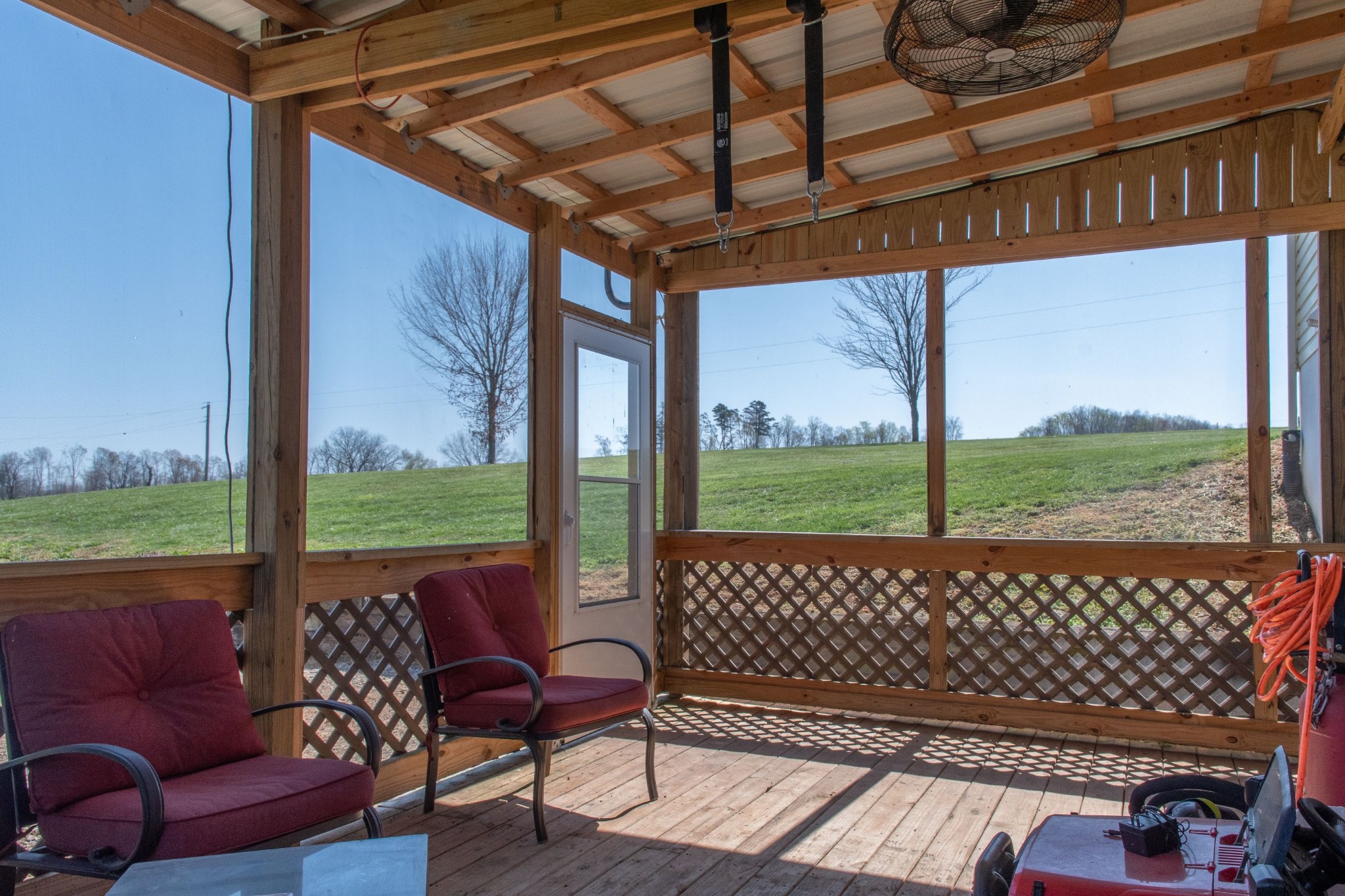 319 Wirmingham Road Monroe, TN 38573 - Photo 20 of 34 a view of a chairs in the patio