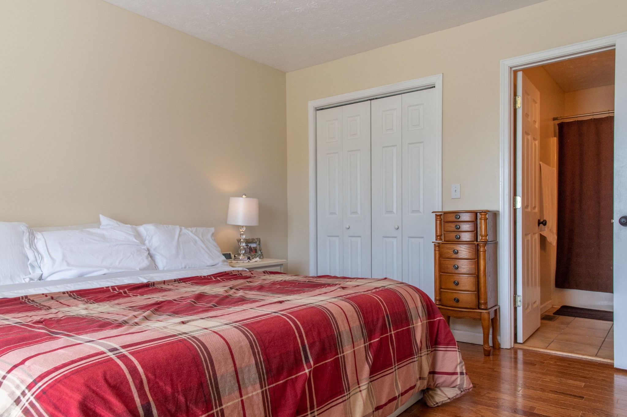 319 Wirmingham Road Monroe, TN 38573 - Photo 7 of 34 a bedroom with a bed and wooden floor