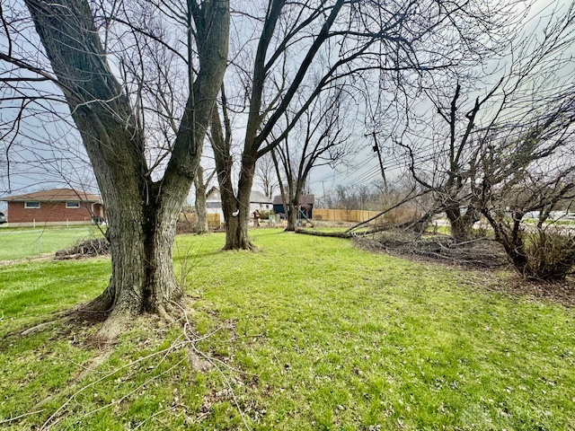 4733 Curtis Drive Springfield, OH 45503 - Photo 5 of 50 Expansive green space provides a perfect backdrop for outdoor enjoyment.
