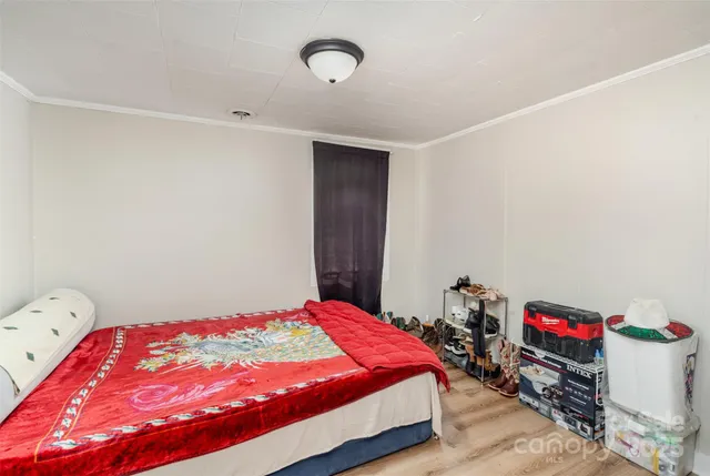 a bedroom with a bed and a closet in it