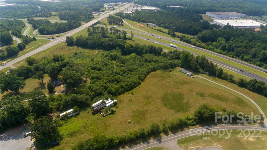 2207 David Baptist Church Road Kings Mountain, NC 28086 - Photo 2 of 10 an aerial view of a house with a yard and lake view
