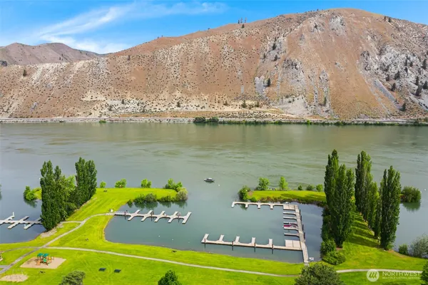 an aerial view of a house with a swimming pool