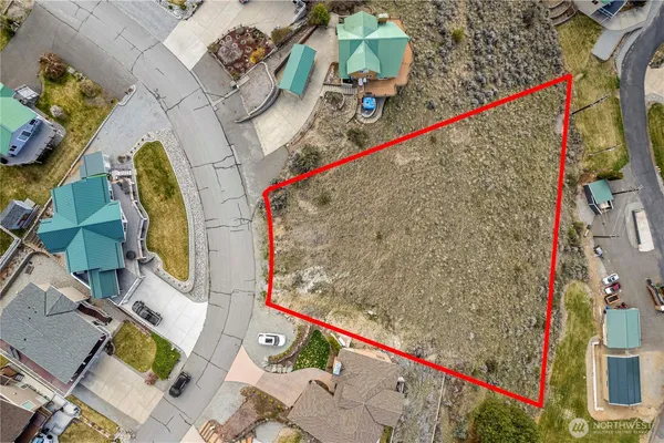 an aerial view of residential house with outdoor space