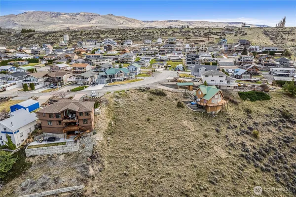 an aerial view of a city with lots of residential buildings