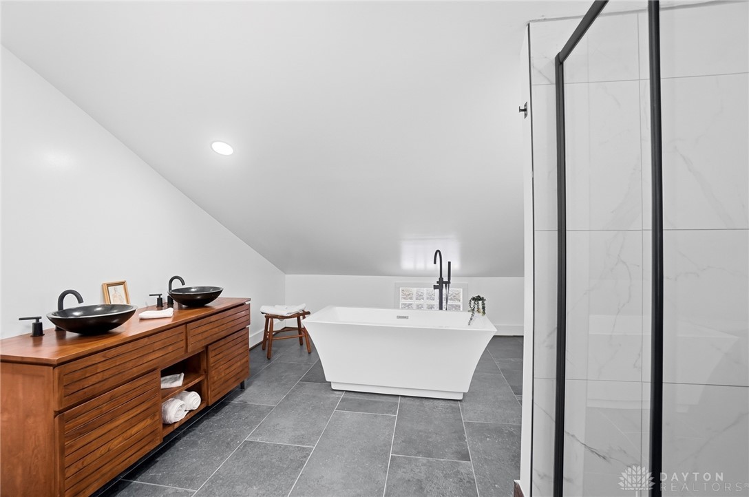 25 Englewood Road Springfield, OH 45504 - Photo 48 of 66 How about this for a relaxing retreat with a contemporary soaking tub and dual vanities.
