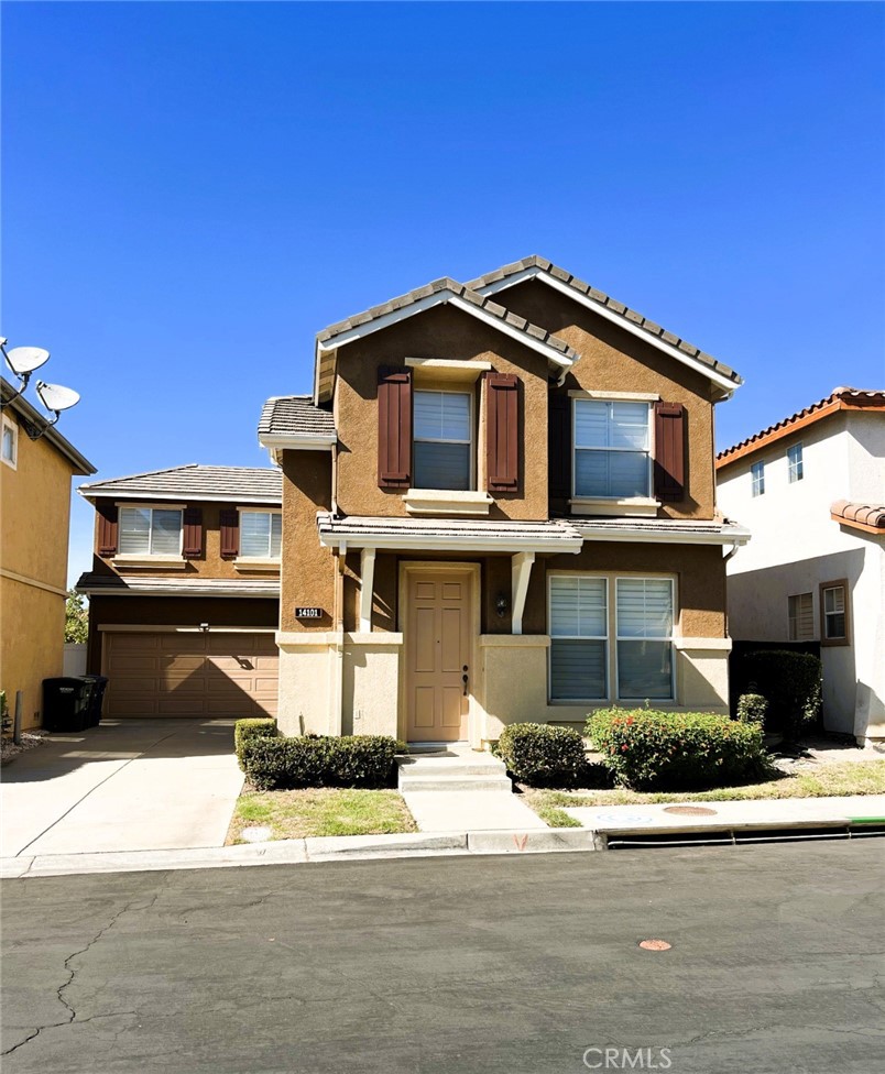 14101 Visions Drive La Mirada, CA 90638 - Photo 1 of 26 a front view of a house with a yard