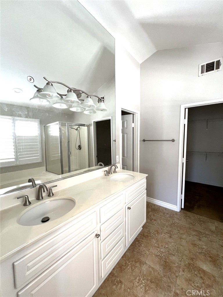 14101 Visions Drive La Mirada, CA 90638 - Photo 12 of 26 a bathroom with a sink and a mirror