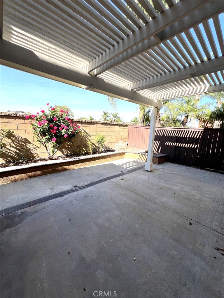 14101 Visions Drive La Mirada, CA 90638 - Photo 18 of 26 a view of a porch with a table and chairs